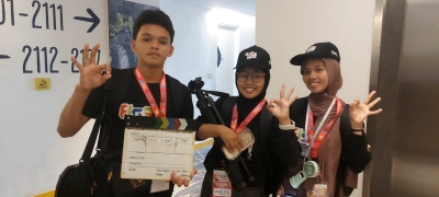 Tim Film Pendek Sulawesi Tenggara dalam ajang FLS3N SMA / SMK Tahun 2025.  Sufyan Nur (Kiri), Ferlita Furi (Tengah), Ade Melinawati (Kanan)
